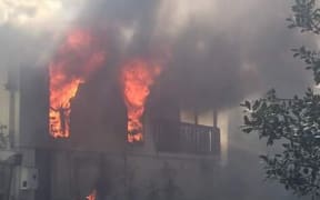 The fire engulfed the house on Archboyd Avenue in Mangere.