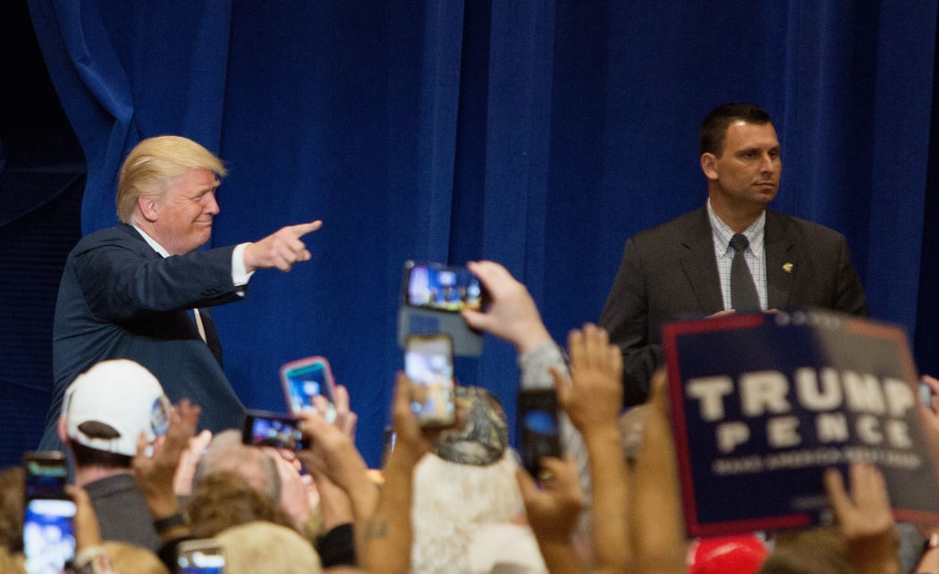 Republican presidential nominee Donald Trump greets supporters during a rally at the KI Convention Center on October 17, 2016 in Green Bay, Wisconsin.