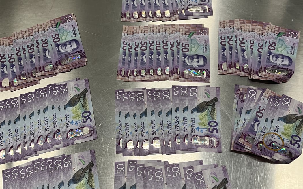 Money seized from police in relation to an alleged blessing scam.