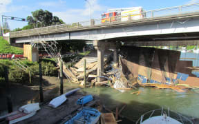The collapsed scaffolding under the bridge.