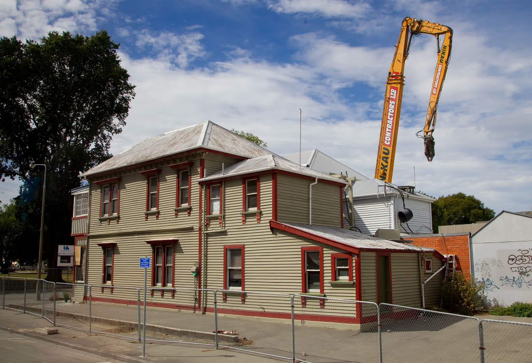 Damaged buildings are demolished in the "Red Zone" area in downtown Christchurch.
