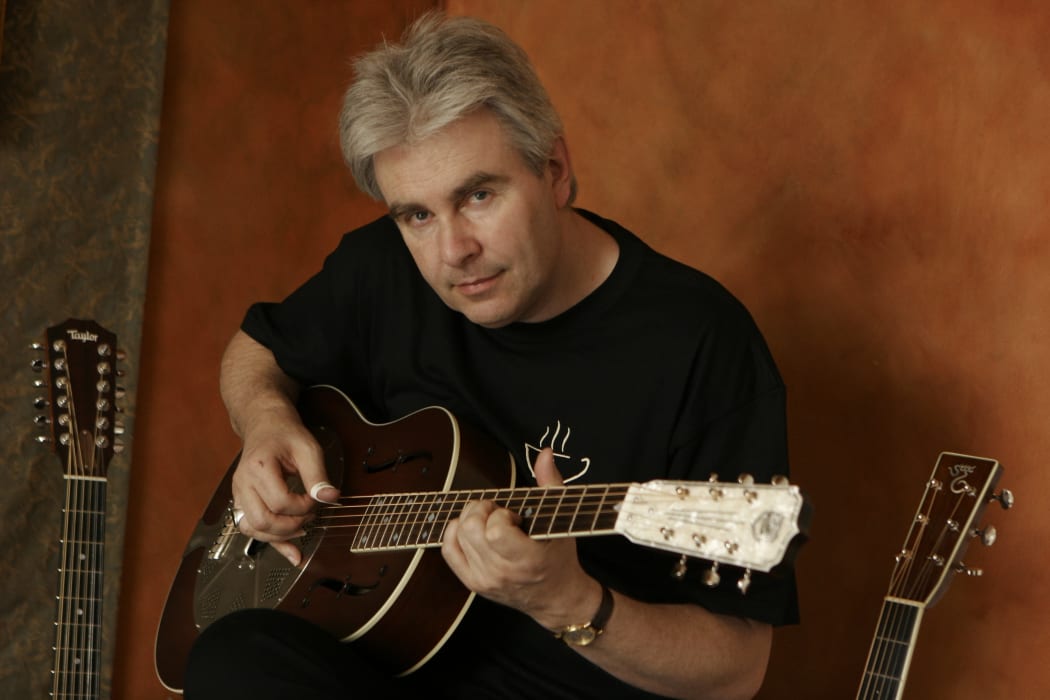 Acoustic blues and roots guitarist Nick Charles