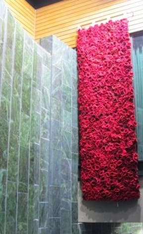 The first panel of poppies in tribute to the fallen servicemen and women of World War One.