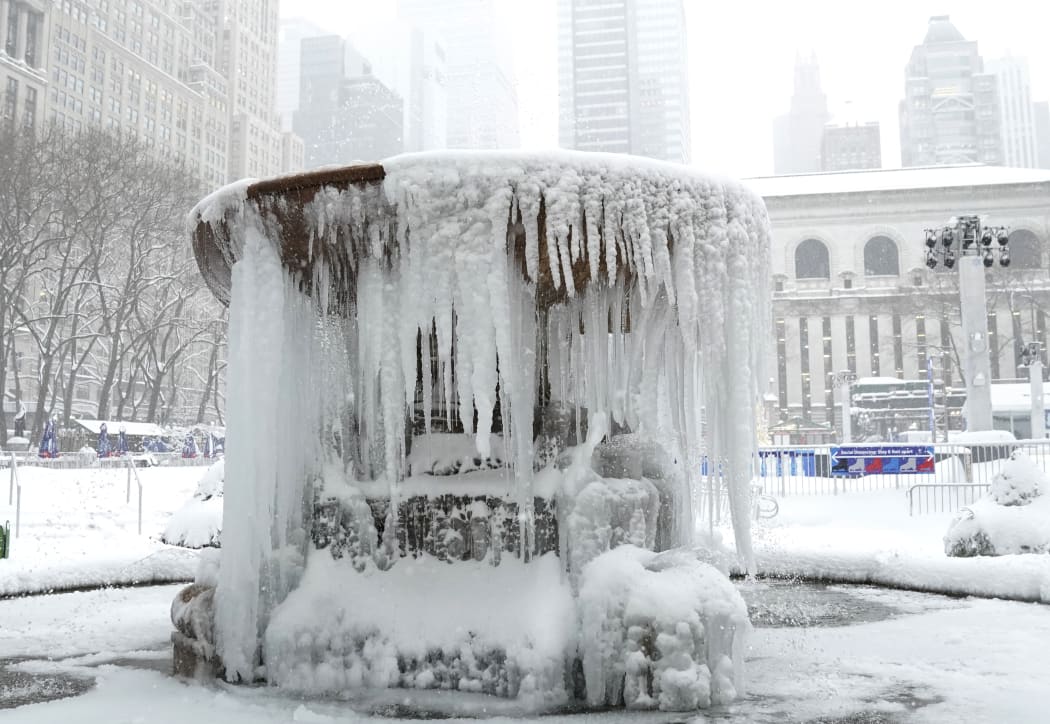 The frozen Josephine Shaw Lowell Memorial Fountain in Bryant Park in NYC