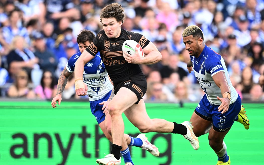 Liam Martin makes a break for the Penrith Panthers.
