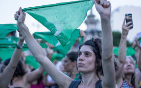 Activists assemble before the National Congress building to call once more for the legalization of the legal, safe, and free abortion in Argentina