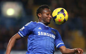 Chelsea player tries to control the ball.
