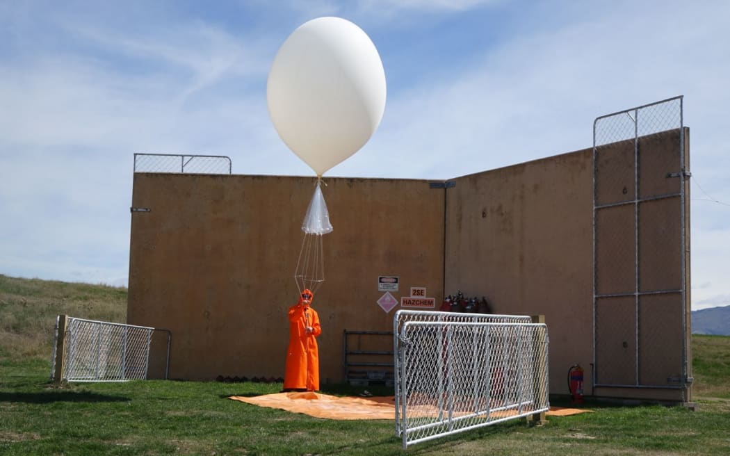 An atmospheric measuring balloon being readied for launch at Lauder