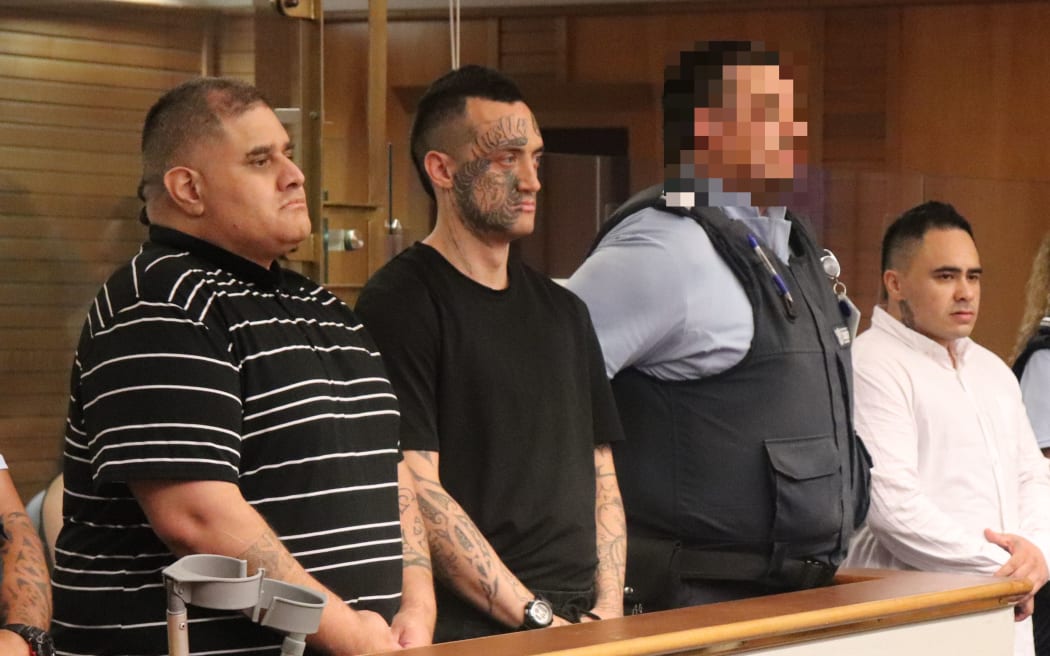 Steven Kingi (left), Jessee Burns (centre) and Stewart Hubbard (right of the guard) are heading to jail after pleading guilty to manslaughter and robbery.