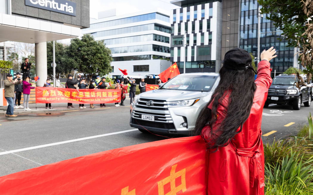 Supporters of Chinese premier Li Qiang waiting outside Fonterra, 15th June, Auckland.