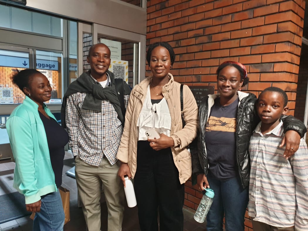 Mercy, centre, who turns 17 today, is celebrating her birthday with family by going on her very first trip on a train.
