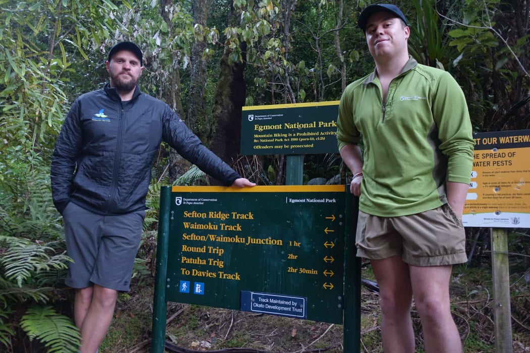 Taranaki Mounga project  manager Sean Zieltjes with DOC field ranger Cody on the Mounga.