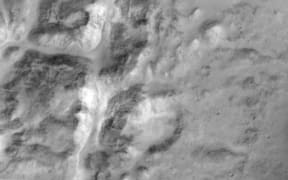 A picture released by the European Space Agency shows close-up of the rim of a large unnamed crater north of a crater named Da Vinci, situated near the Mars equator.