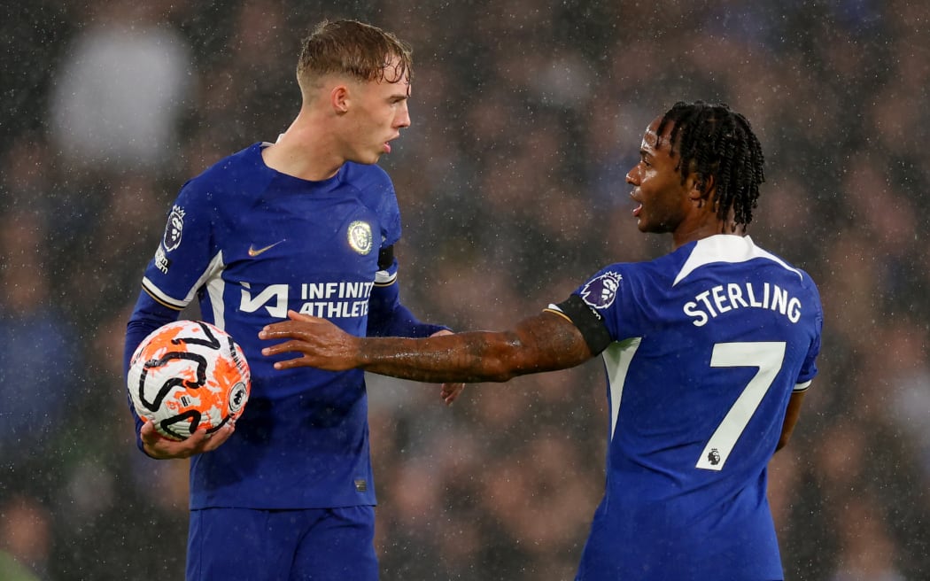 Chelsea team-mates Cole Palmer (L) amd Raheem Sterling.