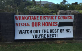 A sign out front of the Whalley's property