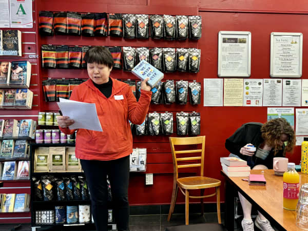 Frances Loo runs a romance book club at Chapter, a romance book and tea shop in Auckland.