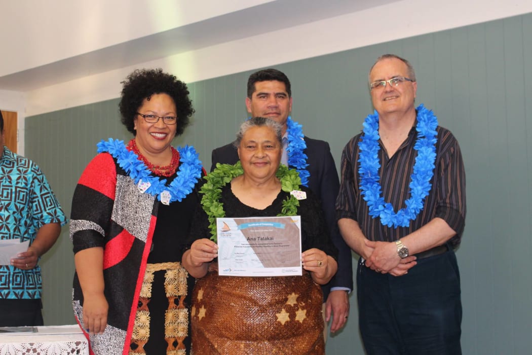 Ana Talakai receiving her certificate.
