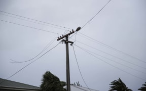 Powerlines down on Brougham St in Westport, live wires being cleared from the footpath.