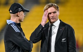 Ceri Evans (Head of Leadership + Mental Performance) and New Zealand coach Scott Robertson dejected after loss to Argentina.