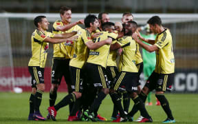 Phoenix players celebrate a Vince Lia goal.