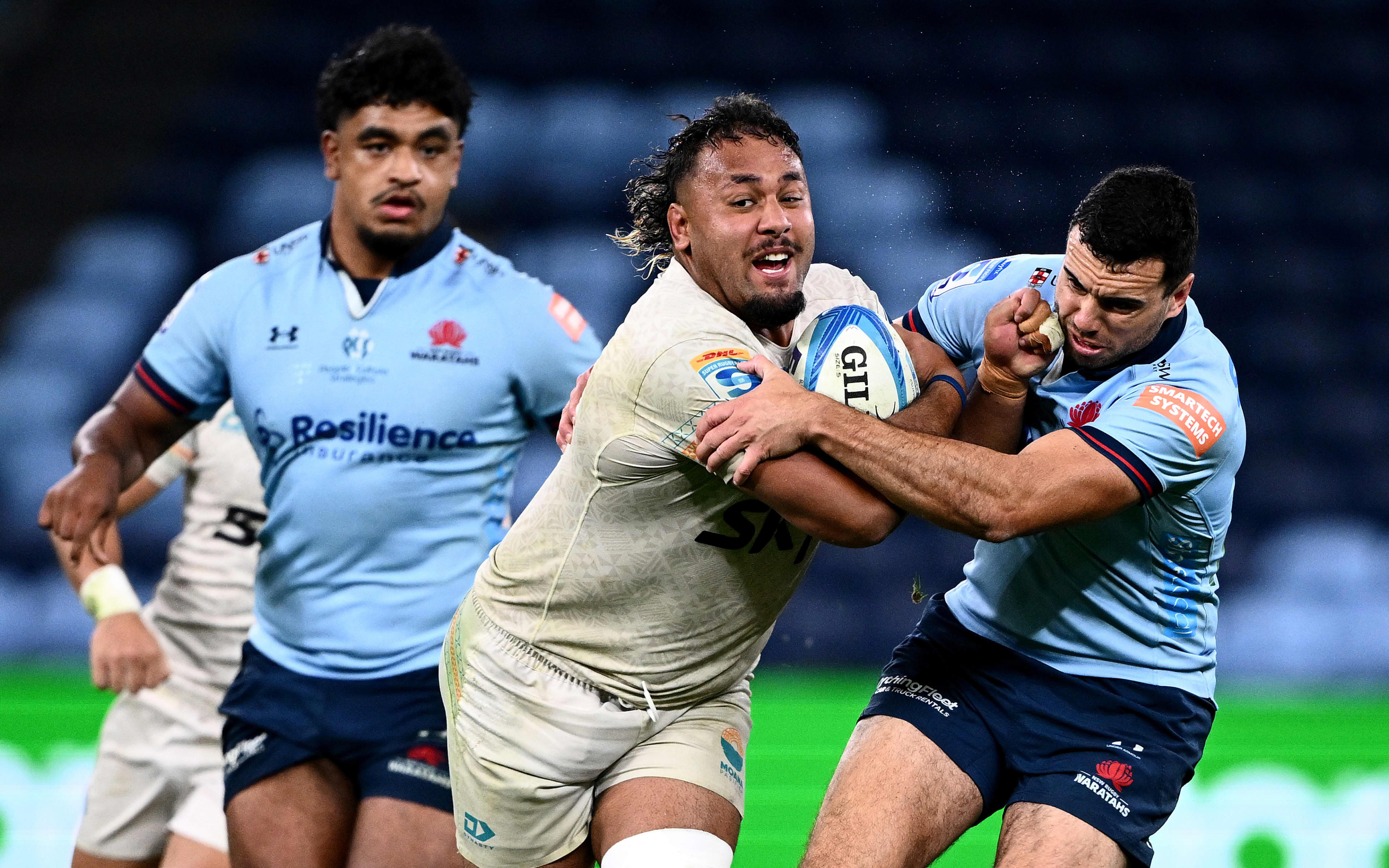 Semisi Tupou Ta'eiloa of Moana Pasifika on the charge against the Waratahs.