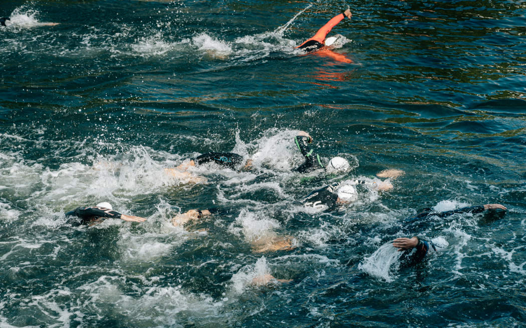 Athletes taking part in the swimming leg of a triathlon
