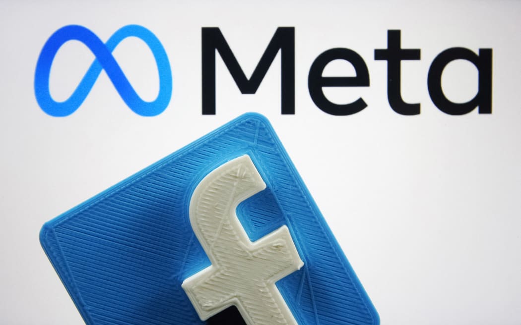 Facebook logo and new company brand Meta Platforms Inc. logo are pictured in this illustrative photo taken in Kyiv on 29 October, 2021.