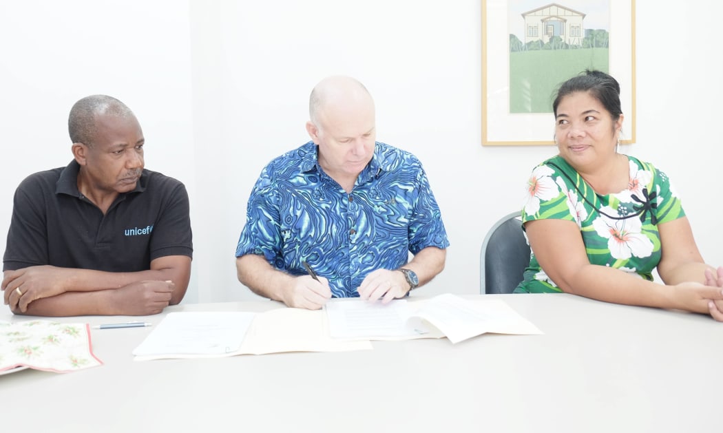 UNICEF Pacific's Cyriaque Sobtafo, New Zealand High Commissioner Paul Wallis and Kaaro Neeti from the Kiribati Ministry of Health.