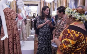 Duchess of Cambridge Kate Middleton (left), New Zealand designer Karen Walker (centre) and Tukua Turia from The Cook Islands chat during a reception to mark the creation of the Commonwealth Fashion Exchange initiative at Buckingham Palace.