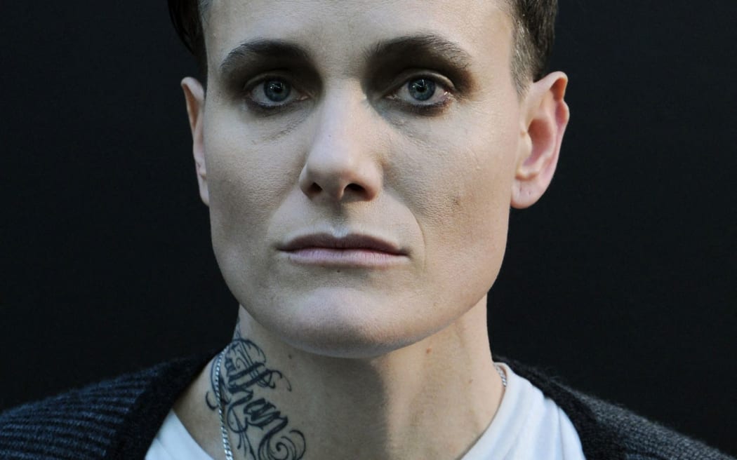 Model Casey Legler poses backstage at the Michael Bastian fall 2013 fashion show during Mercedes-Benz Fashion Week on February 12, 2013 in New York City.
