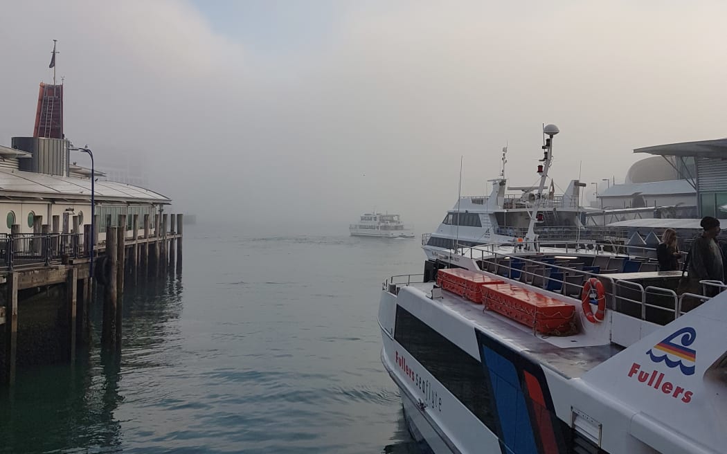 Fog in the harbour as seen from the Downtown Ferry Terminal.