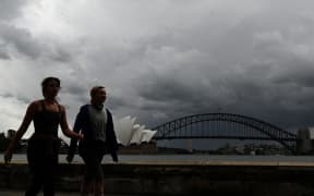 Residents exercise along Sydney Harbour
