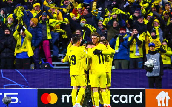 Bodø/Glimt players celebrate a goal against Manchester City, Champions League 2026.