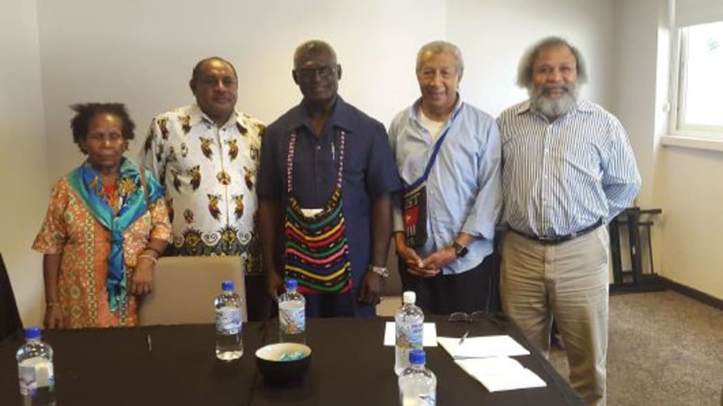 United Liberation Movement for West Papua members Mama Yosepha Alomang, Edison Waromi, Andy
Ayamiseba and Jacob Rumbiak with the Solomon Islands prime minister Manasseh Sogavare (centre),