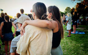 More than 1000 people attend a community vigil at Coronation Park in Tauranga on Thursday, 29 January, 2026, in the wake of the Mt Maunganui landslide.