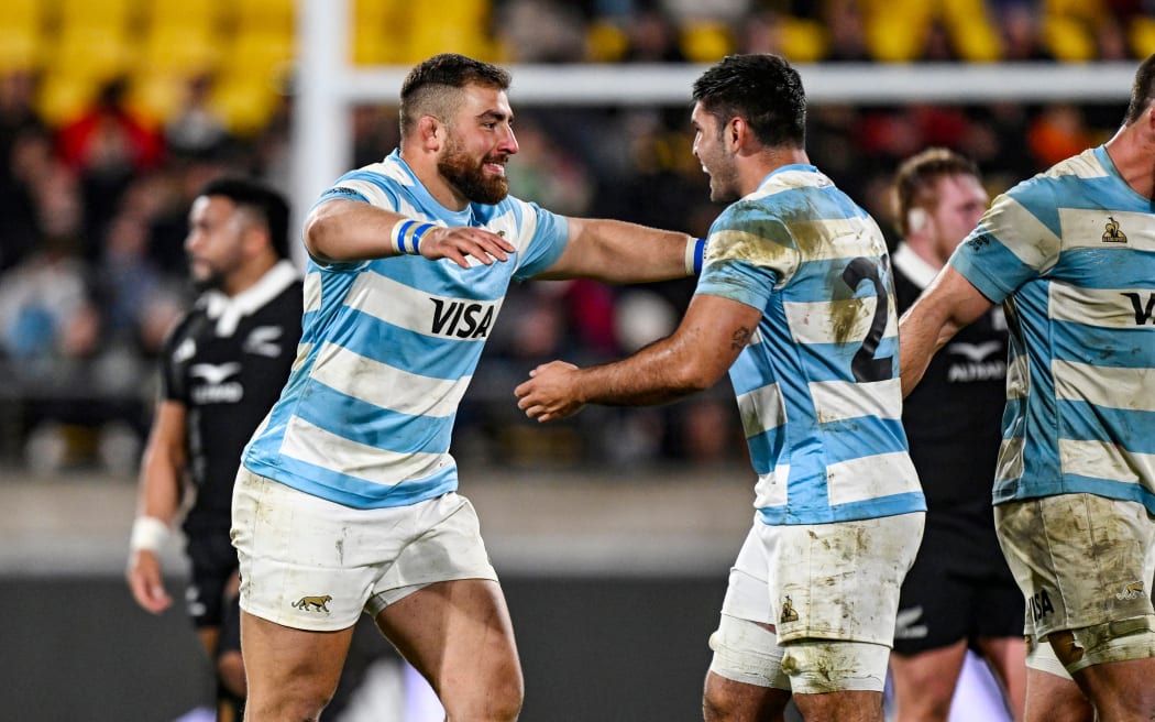 Argentina players celebrate their win 38-30 over New Zealand.