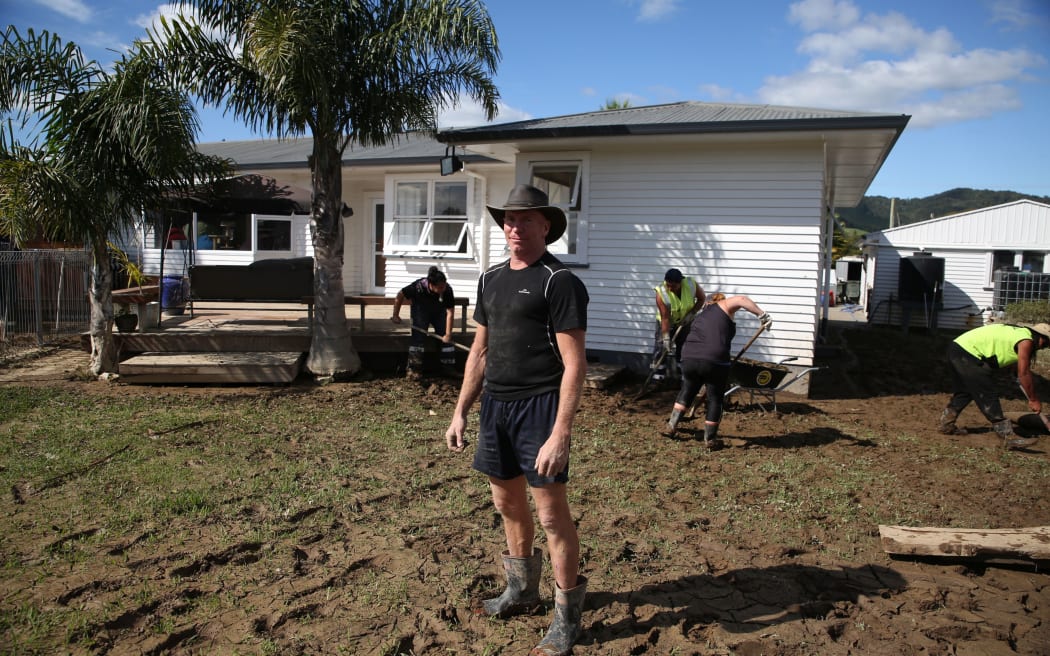 Graham Lyford in front of his home.