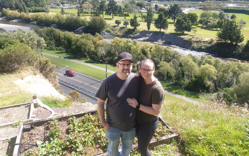 Tim and Jaime Philips have just won an eight-month battle to have the red sticker lifted from their Stokes Valley home after a major slip.