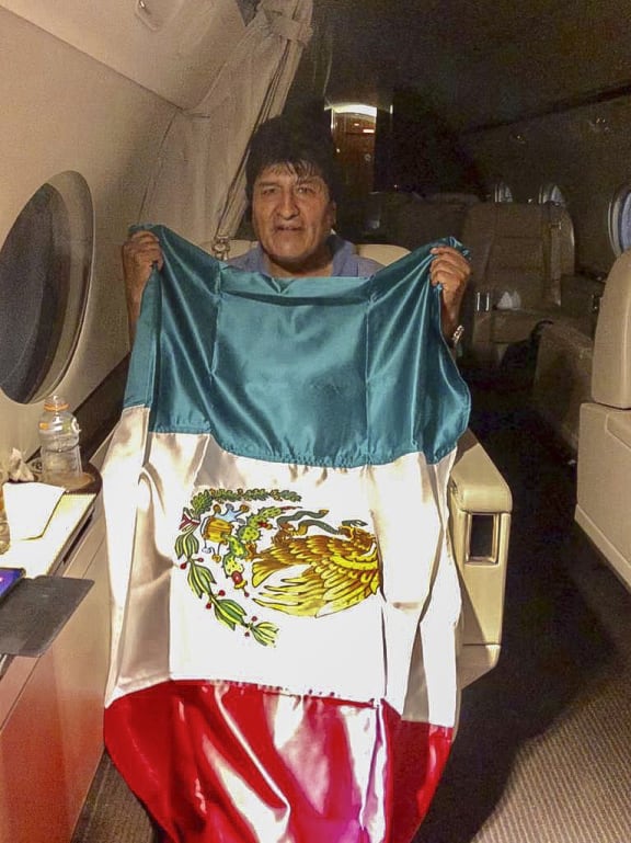 Handout picture released by the Mexican Foreign Ministry press office showing the Bolivian ex-President Evo Morales leaving Bolivia in an aircraft of the Mexican Air Force.