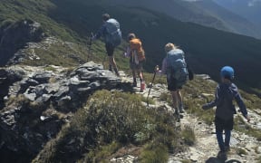 The Williams children walking along the Richmond Ranges.