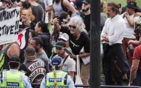 Police made multiple arrests in an effort to remove protesters occupying Parliament's precinct for a third day.