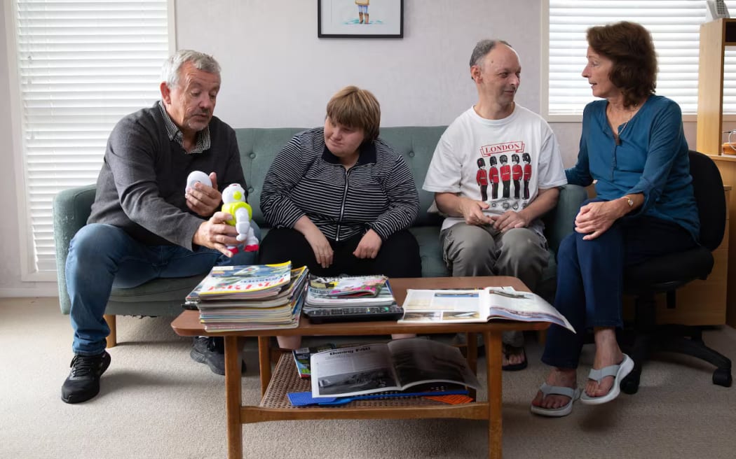 Peter Humphreys (left) with his daughter Sian, and Christine Fleming (right) with her son Justin Coote. Photo / Sylvie Whinray