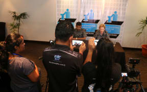 The Mulitnational Observer Group hold a press conference in Suva