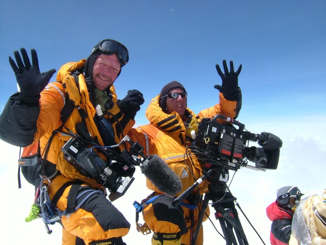 Climbers Dean Staples and Mark Woodward celebrating a joint fifth ascent of Mt Everest.