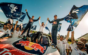 Stephane Peterhansel, Jean Paul Cottret and Bruno Famin (FRA) of Team Peugeot