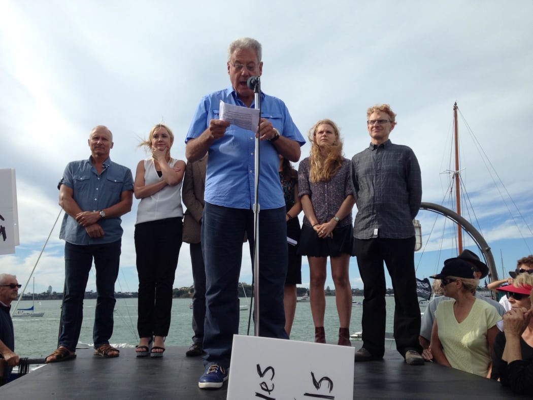 From left to right, sailor Chris Dickson, National MP Nikki Kaye, America’s Cup broadcaster Peter Montgomery (speaking) and protest organisers Millie and Michael Goldwater.