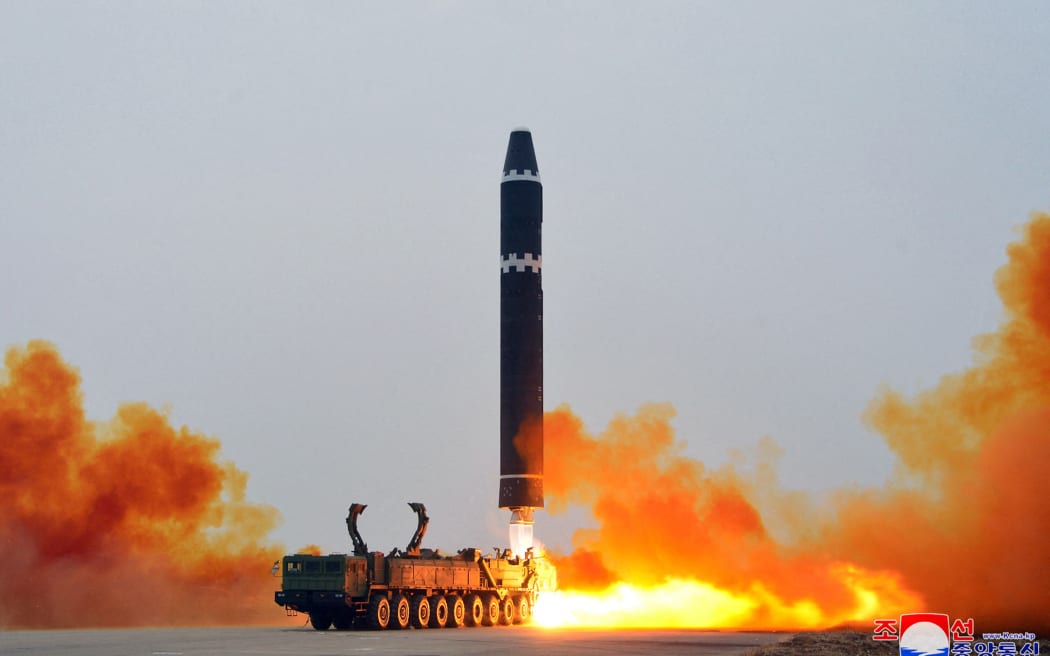 This picture taken on February 18, 2023 and released from North Korea's official Korean Central News Agency (KCNA) on February 19, 2023 shows test-firing of the intercontinental ballistic missile (ICBM) "Hwasong-15", at Pyongyang International Airport. (Photo by STRINGER / KCNA VIA KNS / AFP) / South Korea OUT / ---EDITORS NOTE--- RESTRICTED TO EDITORIAL USE - MANDATORY CREDIT "AFP PHOTO/KCNA VIA KNS" - NO MARKETING NO ADVERTISING CAMPAIGNS - DISTRIBUTED AS A SERVICE TO CLIENTS / THIS PICTURE WAS MADE AVAILABLE BY A THIRD PARTY. AFP CAN NOT INDEPENDENTLY VERIFY THE AUTHENTICITY, LOCATION, DATE AND CONTENT OF THIS IMAGE --- /