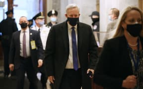 Former White House Chief of Staff Mark Meadows (centre) arrives at  former President Donald Trump's second impeachment trial in the Senate on 9 February, 2021 in Washington, DC.