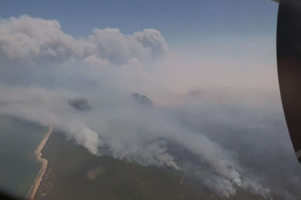 Emergency services say the fire is 50 kilometres in length.