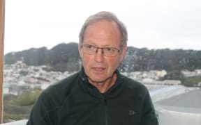 A portrait of historian Jock Phillips at his home in Wellington.
